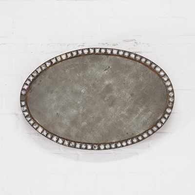 Lot 334 - An oval mirror