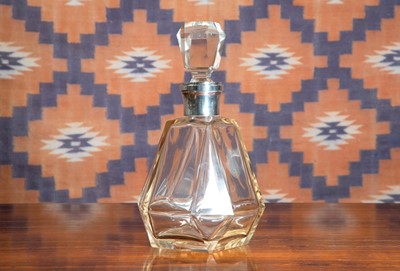 Lot 633 - An Art Deco silver mounted glass decanter