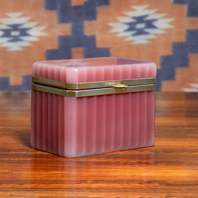 Lot 571 - A pink ribbed glass box