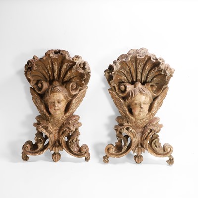 Lot 106 - A pair of baroque-style carved and painted sconces