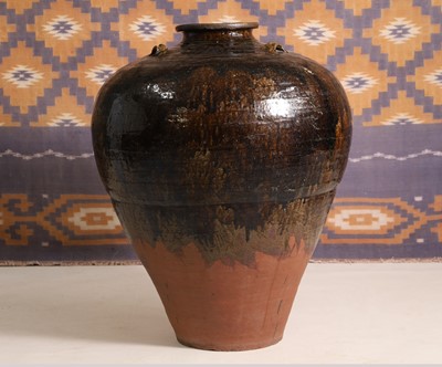 Lot 734 - A Chinese black glazed water jar