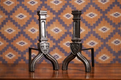 Lot 560 - A pair of cast iron andirons