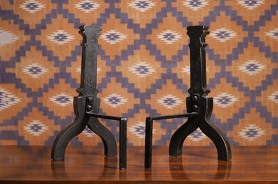 Lot 560 - A pair of cast iron andirons