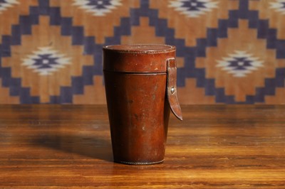 Lot 544 - A leather cased set of six horn stirrup cups