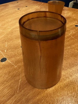 Lot 544 - A leather cased set of six horn stirrup cups
