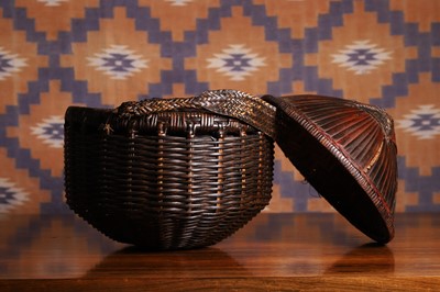Lot 712 - A Chinese woven bamboo hat
