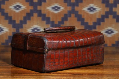 Lot 644 - A crocodile leather travelling gladstone vanity case