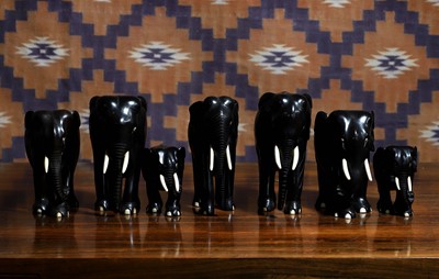 Lot 600 - A group of seven Indian ebony elephant figures