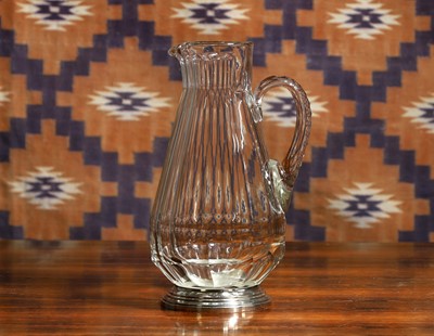 Lot 599 - A cut glass claret jug