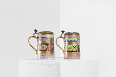 Lot 423 - A pair of Vienna porcelain and gilt-metal-mounted tankards