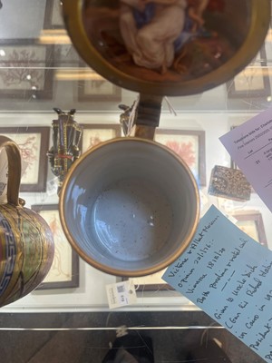 Lot 423 - A pair of Vienna porcelain and gilt-metal-mounted tankards