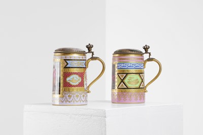 Lot 423 - A pair of Vienna porcelain and gilt-metal-mounted tankards