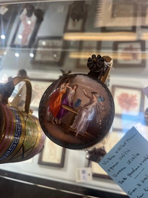 Lot 423 - A pair of Vienna porcelain and gilt-metal-mounted tankards