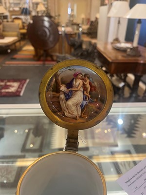 Lot 423 - A pair of Vienna porcelain and gilt-metal-mounted tankards