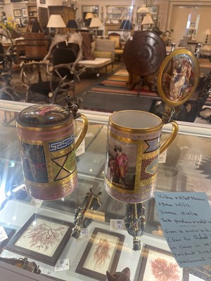 Lot 423 - A pair of Vienna porcelain and gilt-metal-mounted tankards