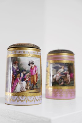 Lot 423 - A pair of Vienna porcelain and gilt-metal-mounted tankards