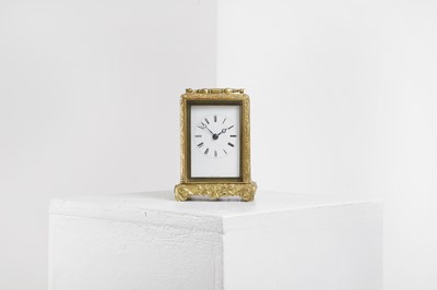 Lot 435 - A brass carriage clock by Jules of Paris