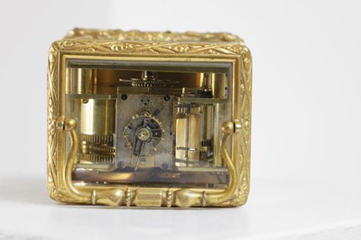 Lot 435 - A brass carriage clock by Jules of Paris