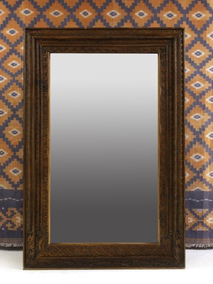 Lot 682 - A carved teak framed mirror