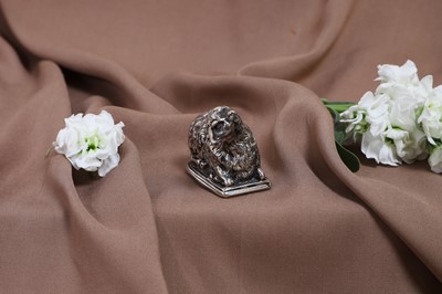 Lot 622 - A white-metal figural vinaigrette
