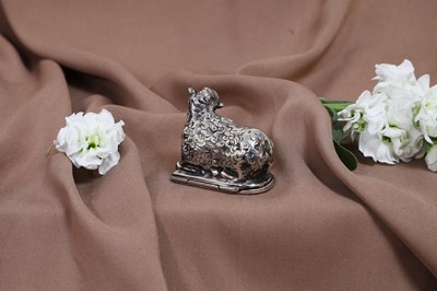 Lot 622 - A white-metal figural vinaigrette