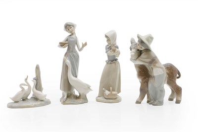 Lot 146 - A group of Lladro and Nao porcelain figures