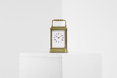 Lot 429 - A brass carriage clock