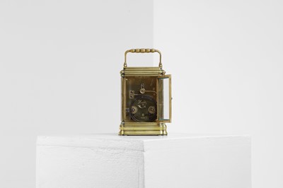 Lot 429 - A brass carriage clock