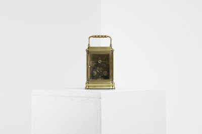 Lot 429 - A brass carriage clock