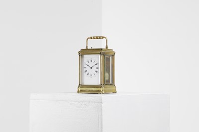 Lot 429 - A brass carriage clock