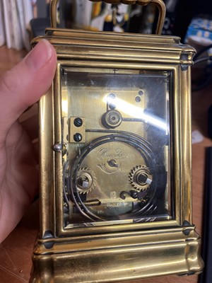 Lot 429 - A brass carriage clock
