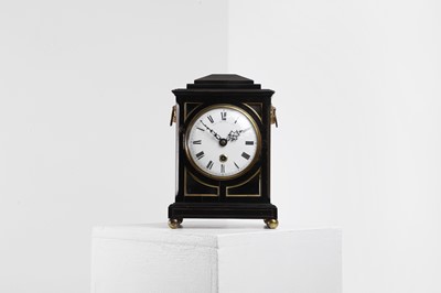 Lot 431 - A George III ebonised table timepiece