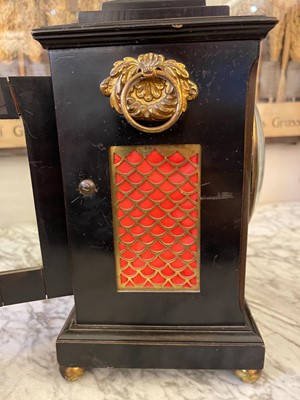 Lot 431 - A George III ebonised table timepiece