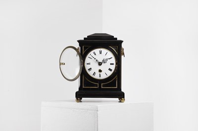 Lot 431 - A George III ebonised table timepiece