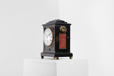 Lot 431 - A George III ebonised table timepiece