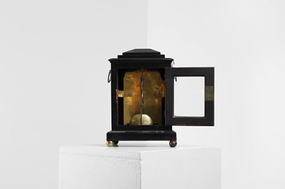 Lot 431 - A George III ebonised table timepiece