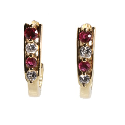 Lot 131 - A pair of ruby and diamond hoop earrings