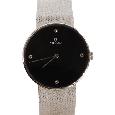 Lot 365 - An 18ct white gold Milus mechanical bracelet watch