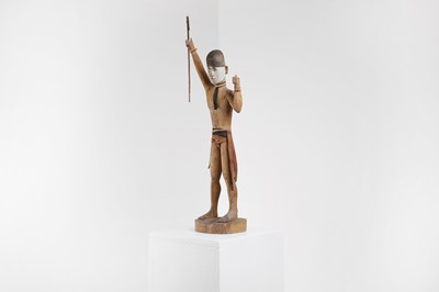 Lot 386 - A 'scare-devil' or kareau figure