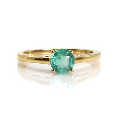 Lot 150 - An 18ct gold emerald single stone ring