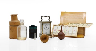 Lot 406 - An apothecary bottle in boxwood case