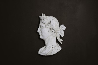Lot 638 - A painted plaster profile portrait