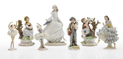 Lot 344 - A collection of porcelain figurines