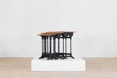 Lot 201 - A nest of four burr oak and ebonised tables