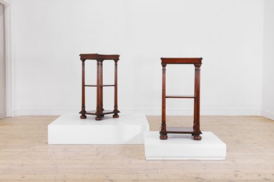 Lot 602 - A pair of Regency-style mahogany and ebonised side tables