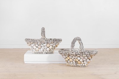 Lot 483 - A pair of shell-encrusted composition stone baskets