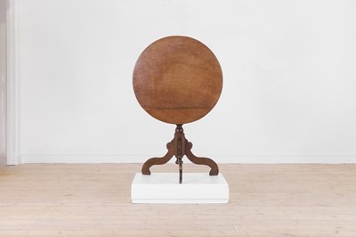 Lot 490 - An oak tripod table
