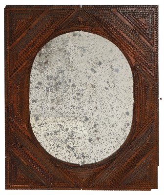 Lot 611 - A 'tramp art' carved wooden mirror