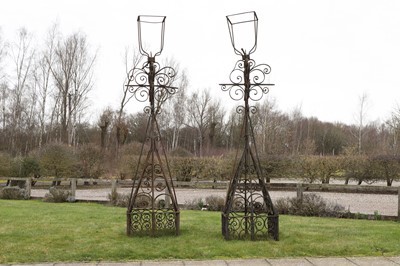 Lot 717 - A pair of painted wrought-iron lantern stands