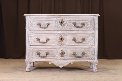 Lot 502 - A provincial Louis XV limed walnut commode